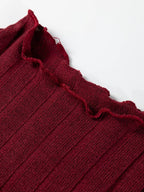 Robe mini maille côtelée col volant - gros plan sur les manches longues et le tombé impeccable -Silhouette-chic
