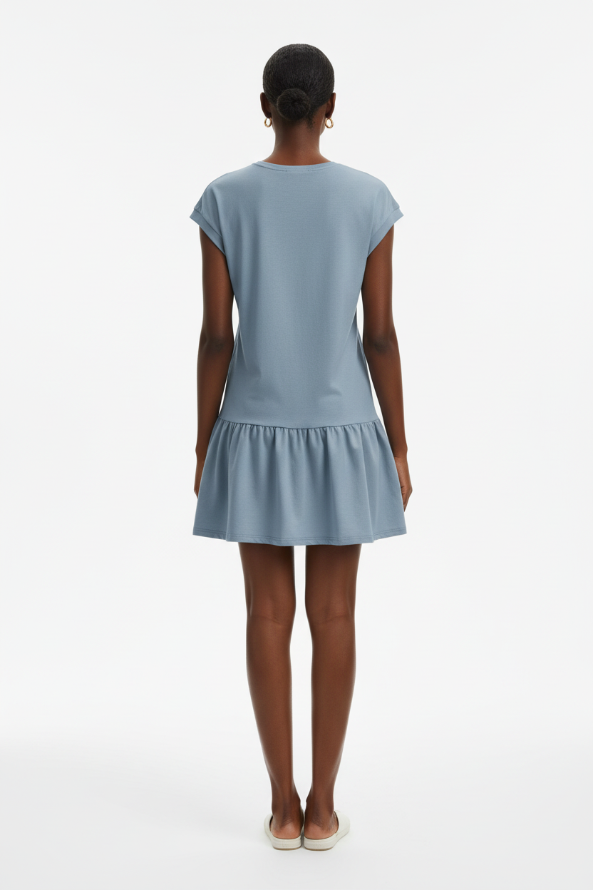 Vue arrière de la robe t-shirt mini col rond à manches cap en bleu français sur fond blanc studio - dos révélant le volant bas romantique et la coupe décontractée de la robe mini - Détail du design casual chic - Style premium Black-Coat