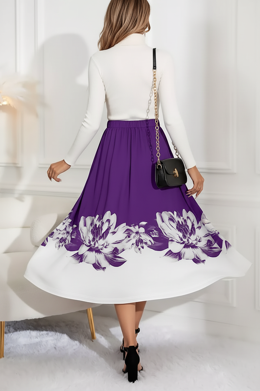 Jupe midi ligne A imprimé floral violette - vue arrière montrant mannequin s'éloignant avec silhouette A-line bordure florale blanche et flux élégant de la jupe midi - BLACK-COAT