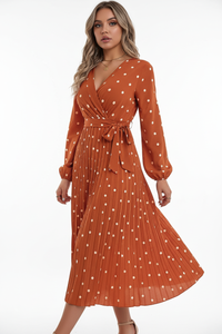 Gepunktetes Midikleid mit Schleife vorne und Faltenrock