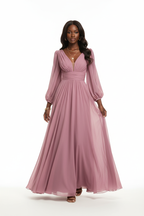 Robe maxi chiffon rose mauve enchanté à décolleté en V profond, manches ballon dramatiques en mousseline transparente et taille empire fronc\u00e9e — vue de face révélant la douceur romantique du coloris, le volume dramatique des manches et la jupe évasée fluide virevolante — bijoux dorés, sandales nude à talons — Silhouette-Chic