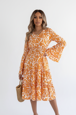 Robe Imprimé Floral Smockée Ourlet à Volants Manches Évasées - La Romance Bohème